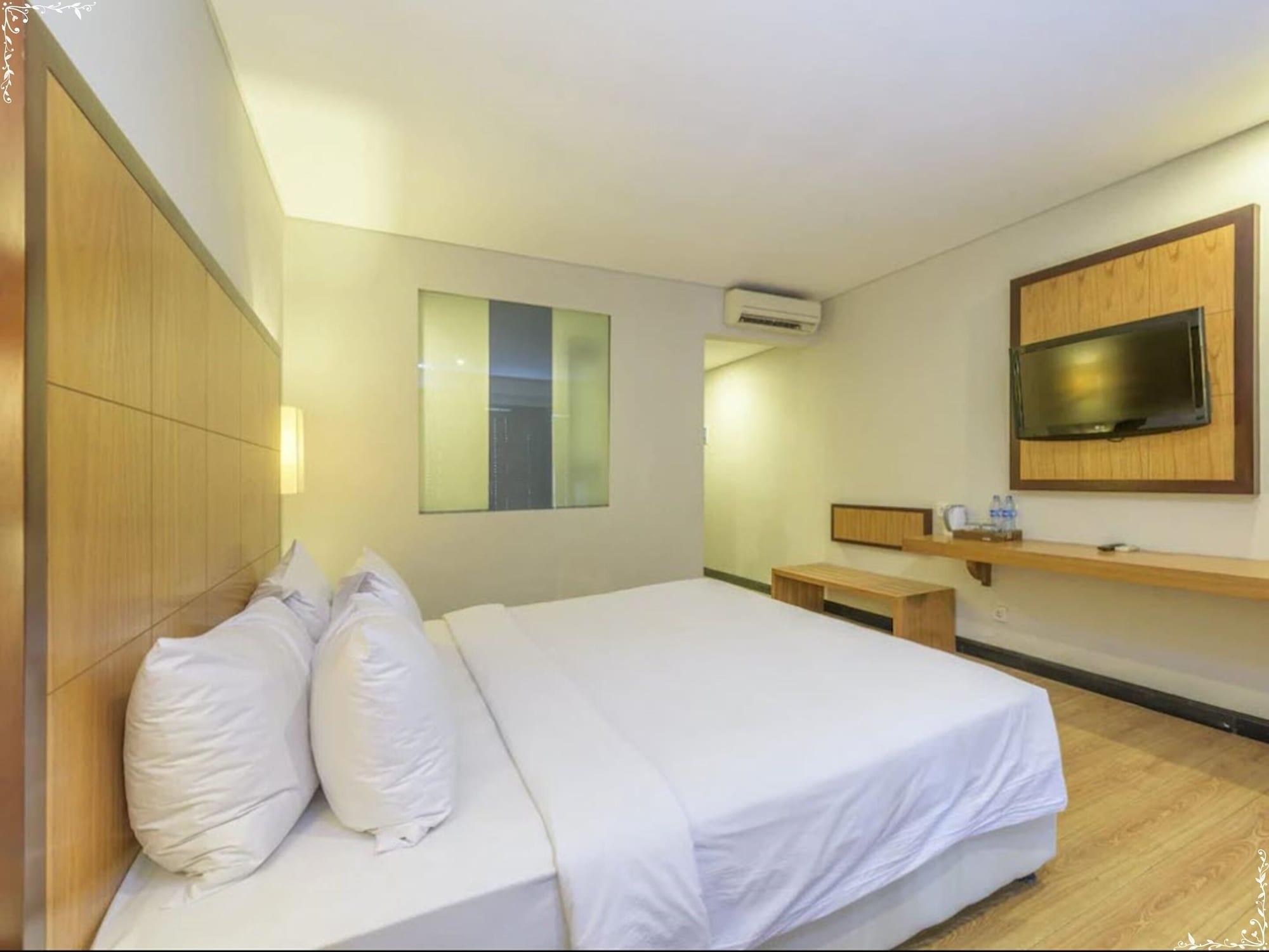 Dekuta Hotel Кута Екстериор снимка