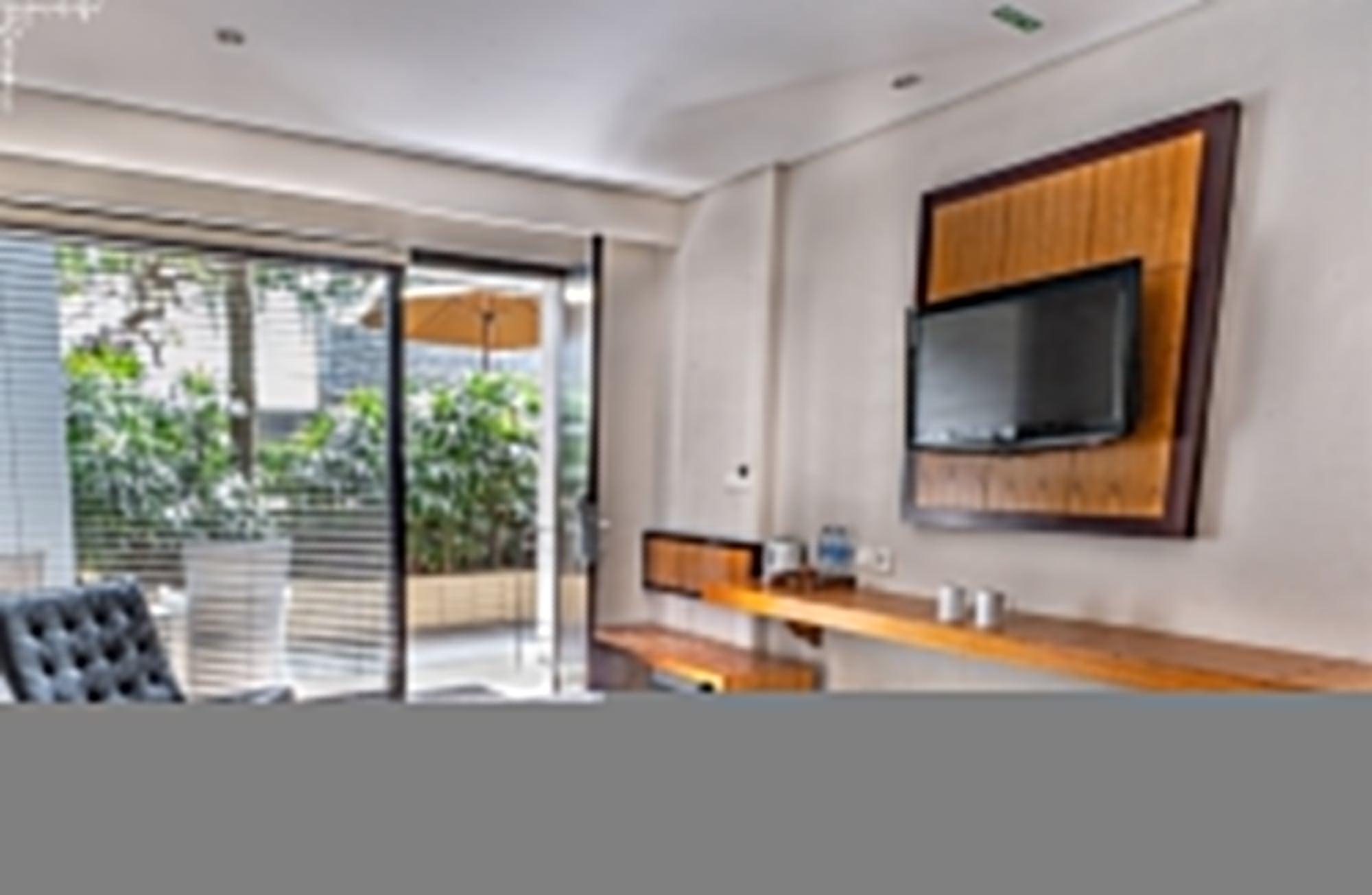 Dekuta Hotel Кута Екстериор снимка