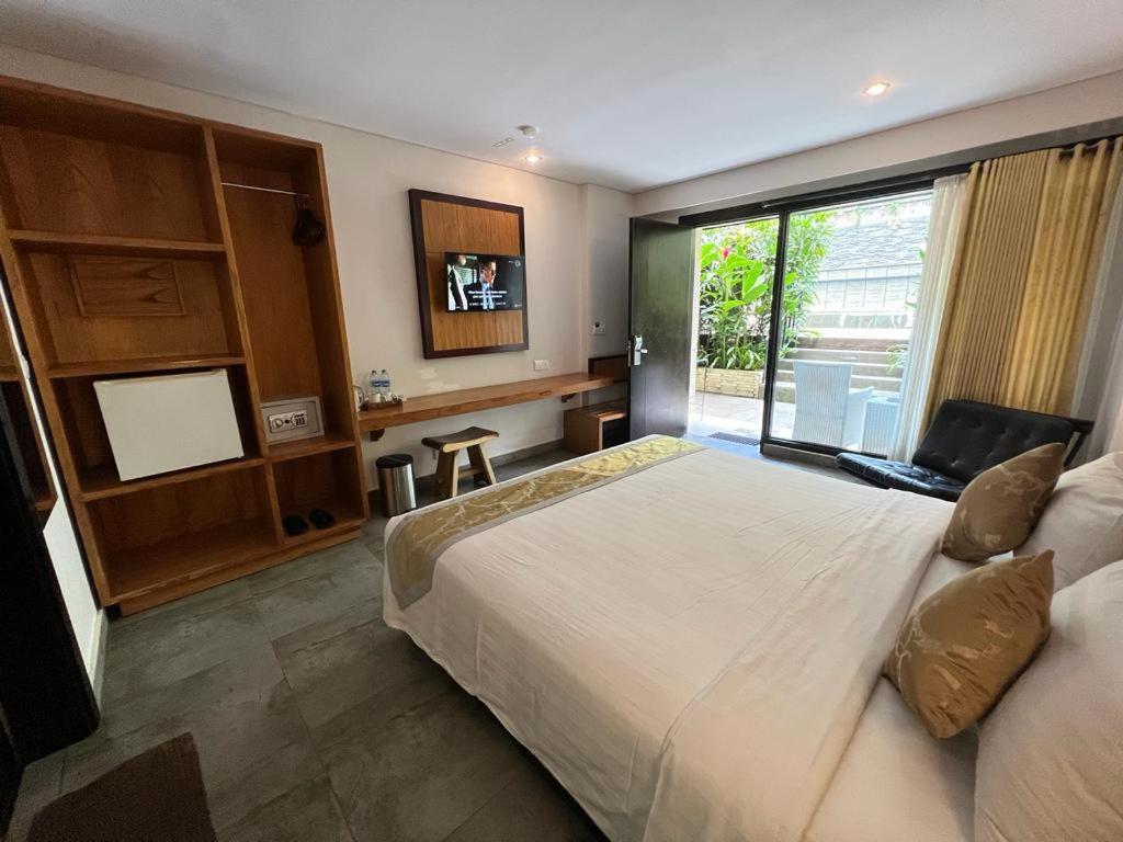 Dekuta Hotel Кута Екстериор снимка