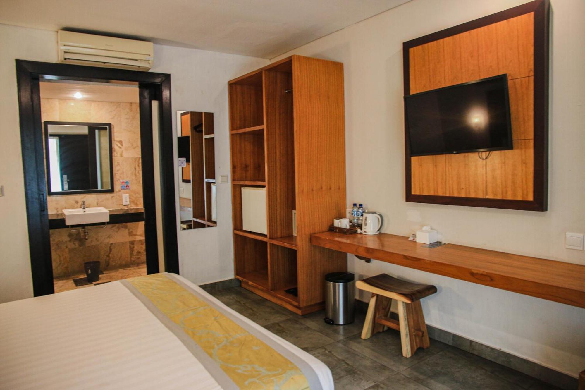 Dekuta Hotel Кута Екстериор снимка