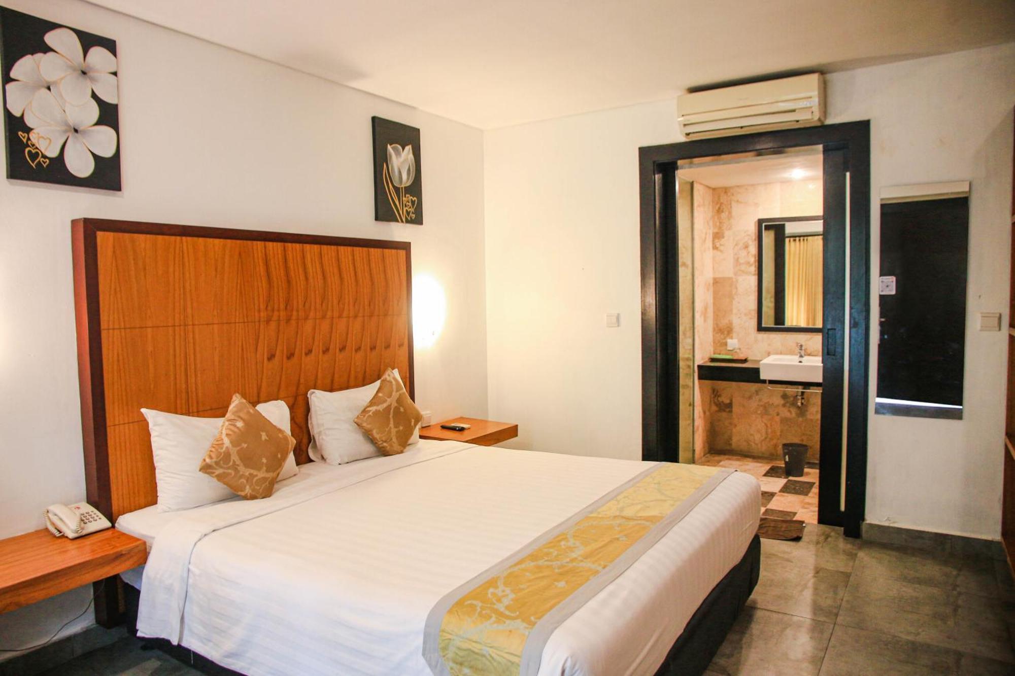 Dekuta Hotel Кута Екстериор снимка