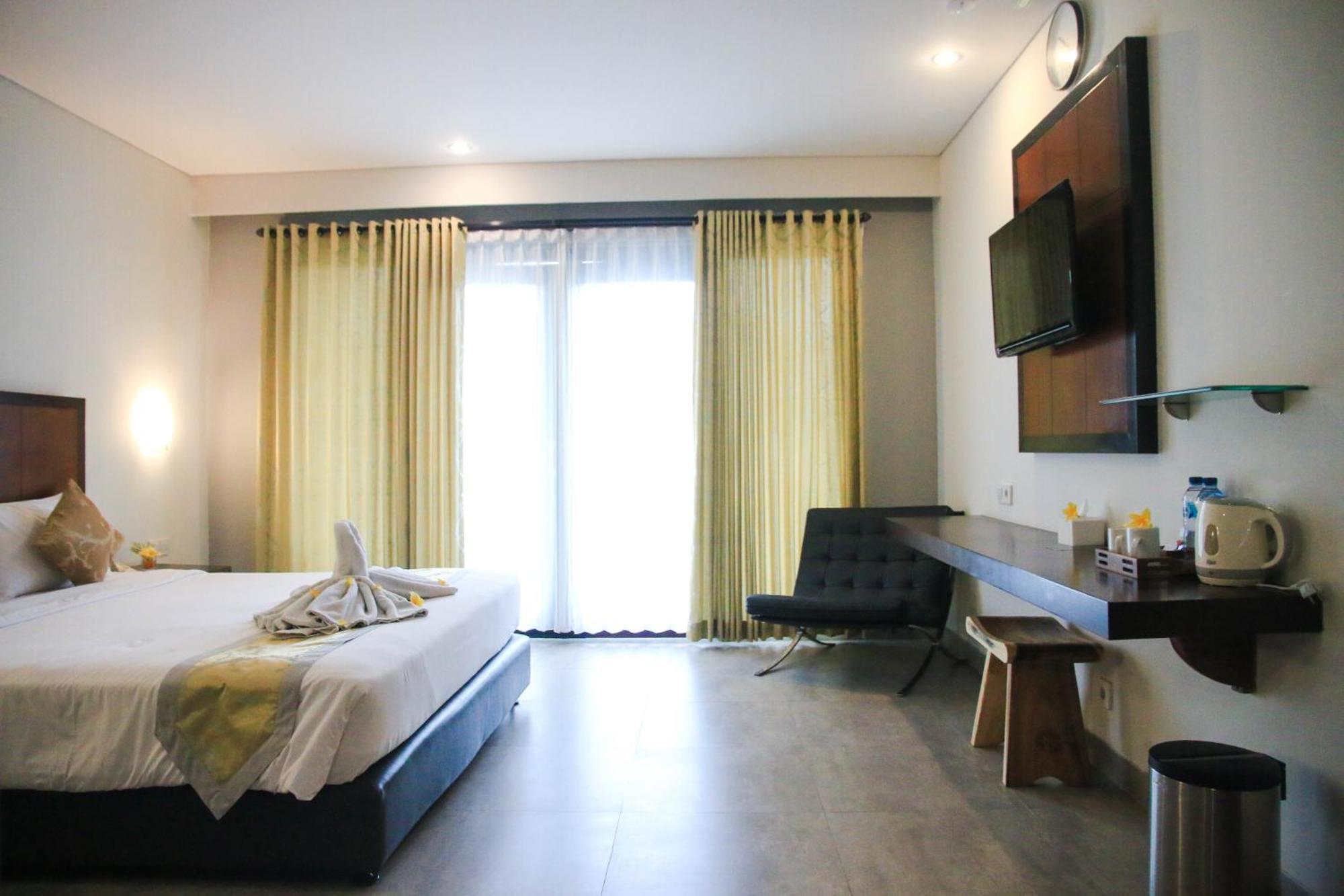 Dekuta Hotel Кута Екстериор снимка