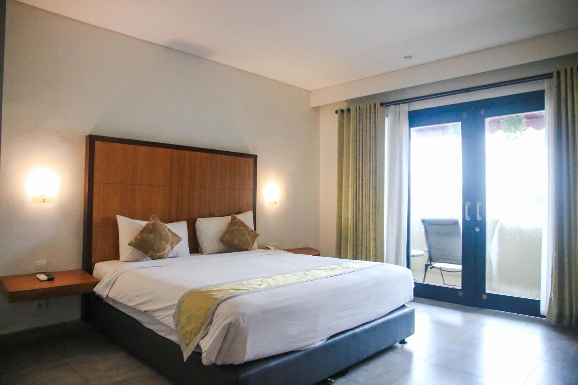 Dekuta Hotel Кута Екстериор снимка