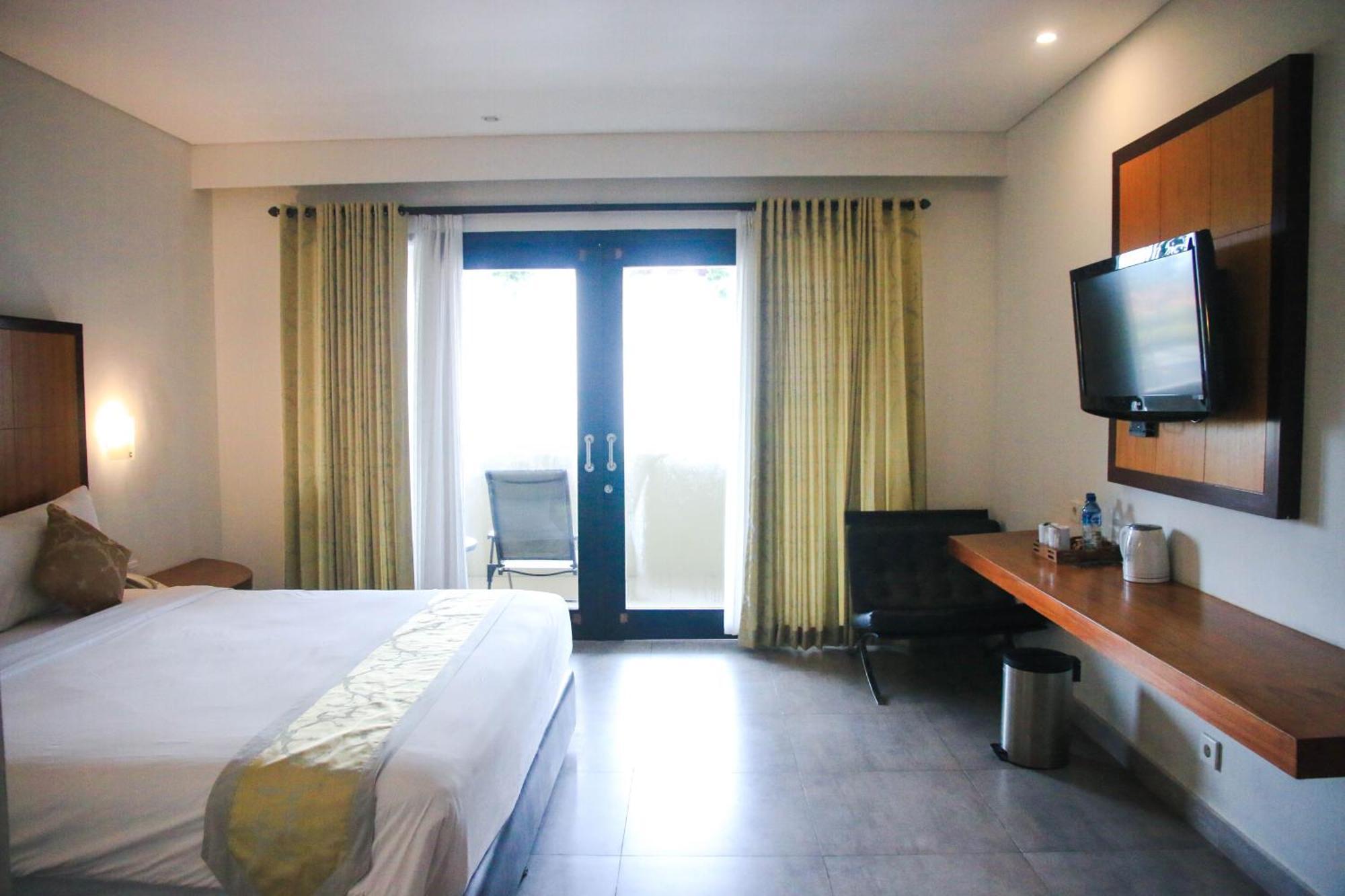 Dekuta Hotel Кута Екстериор снимка