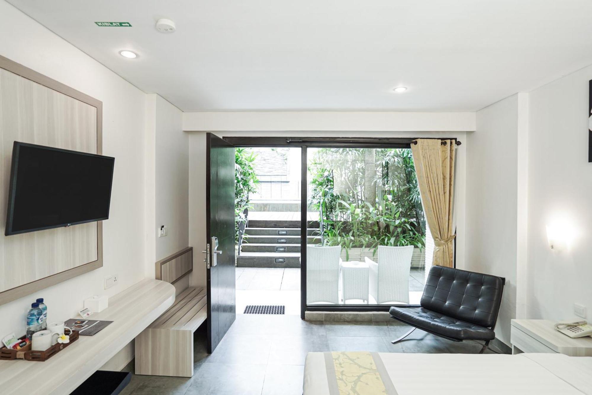 Dekuta Hotel Кута Екстериор снимка