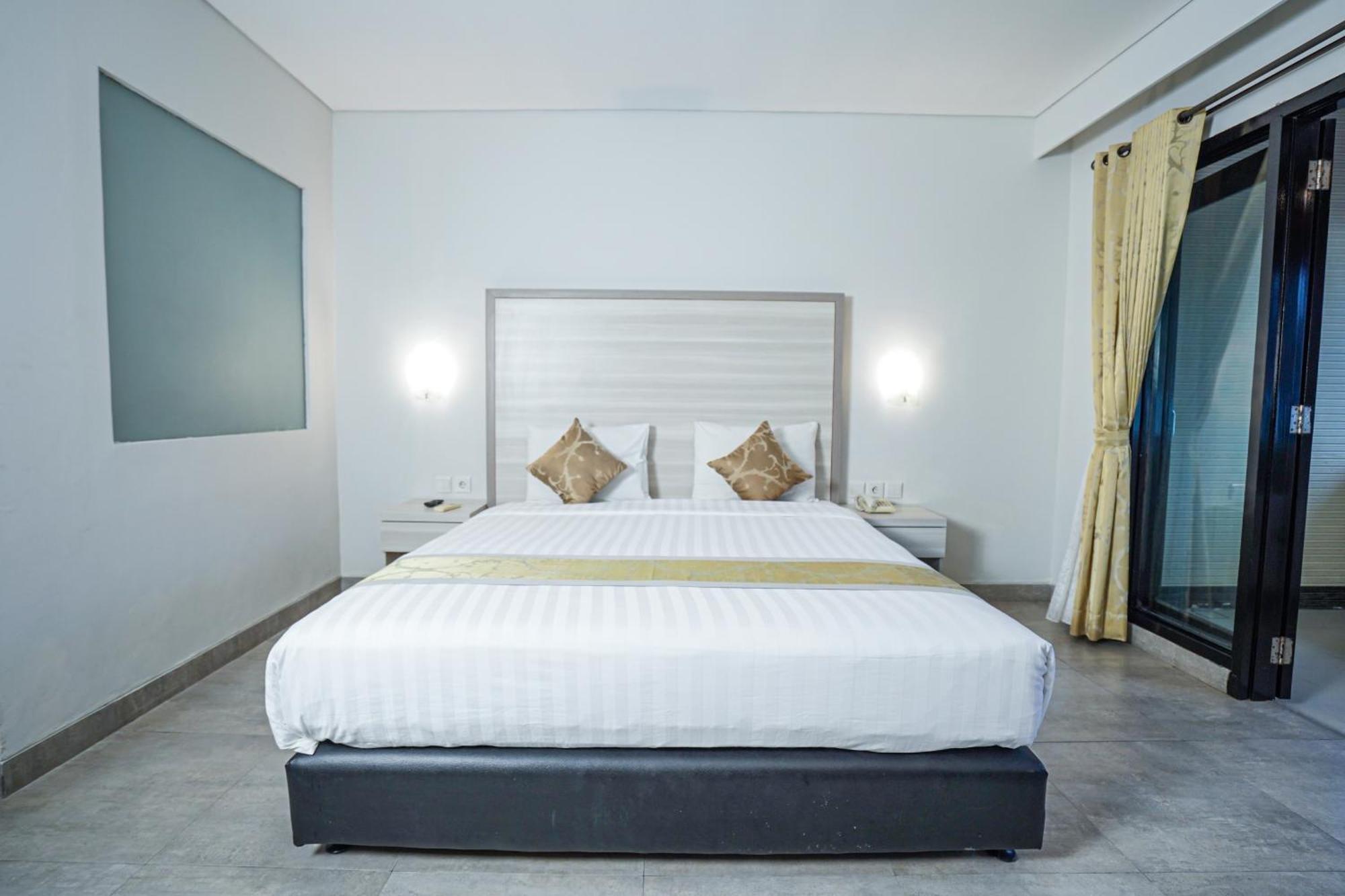 Dekuta Hotel Кута Екстериор снимка